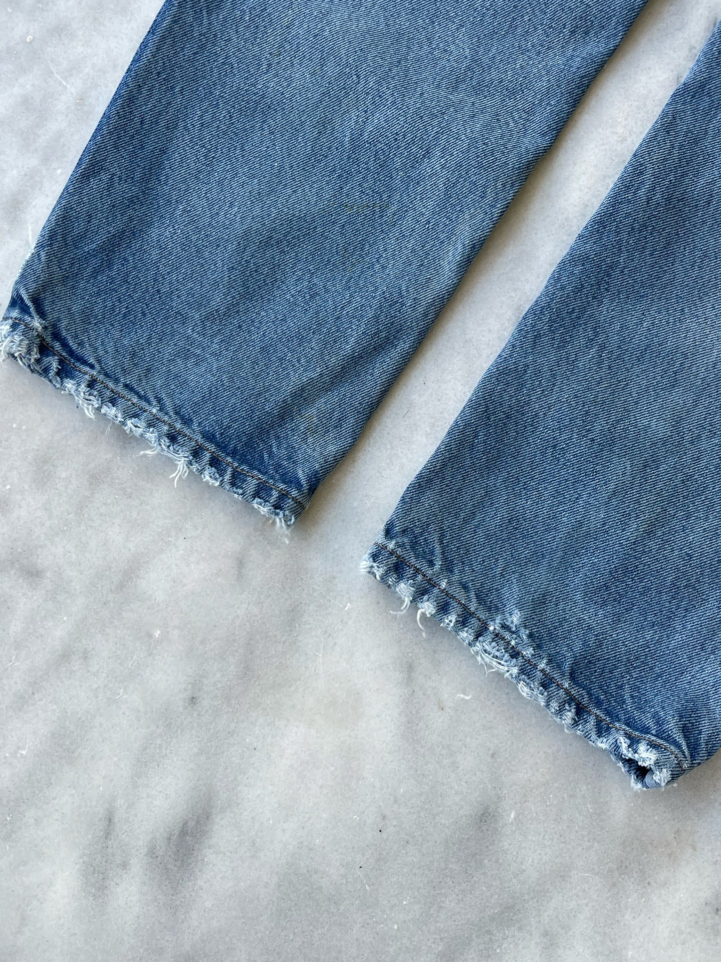 CARHARTT DISTRESSED DENIM PANTS WITH CUTS