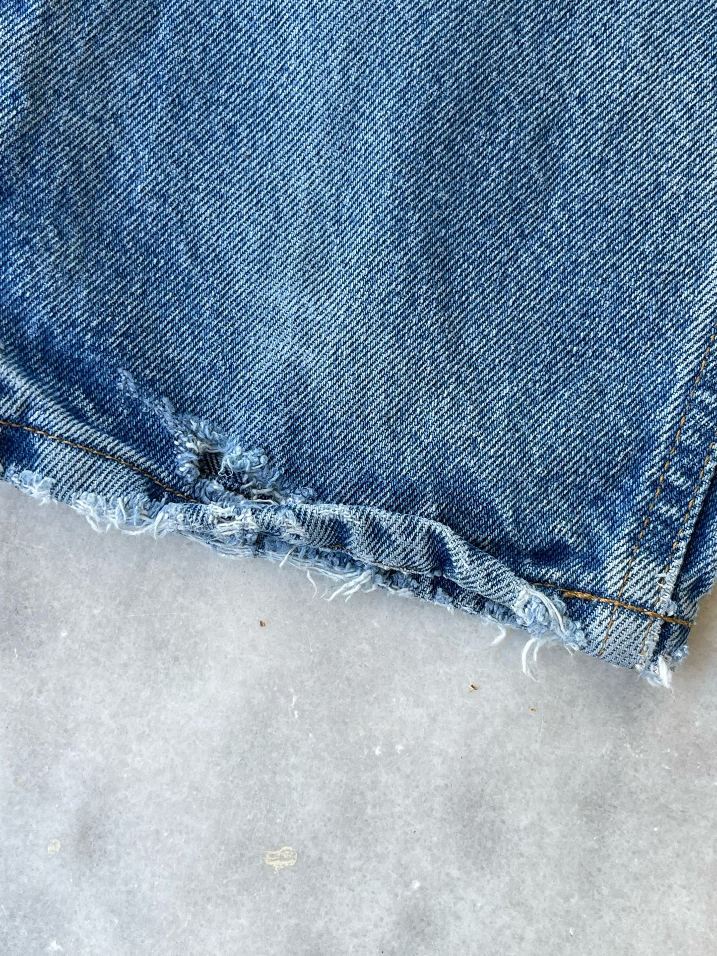 CARHARTT DISTRESSED DENIM PANTS WITH CUTS