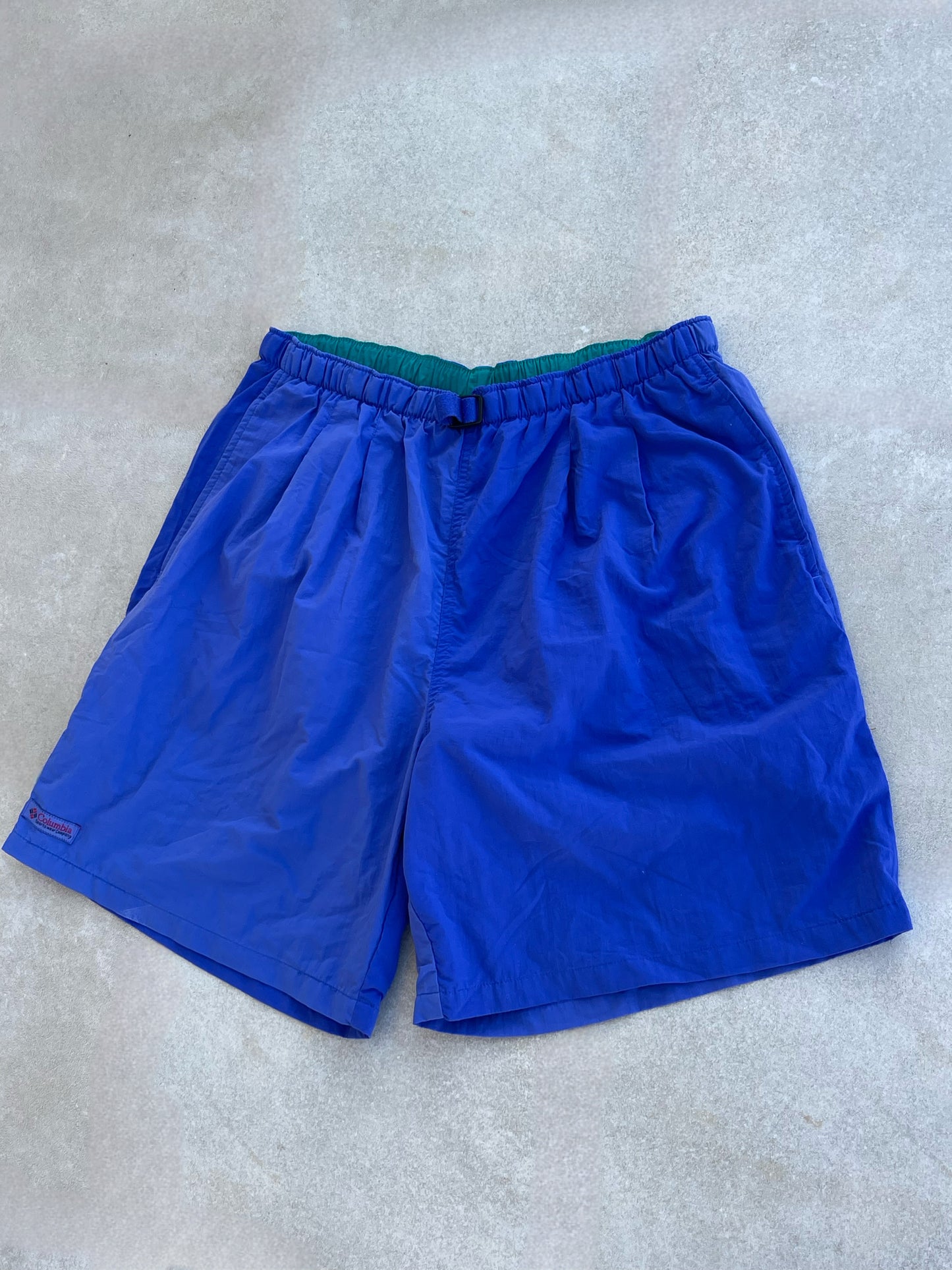 COLUMBIA 90s PURPLE SWIM SHORTS